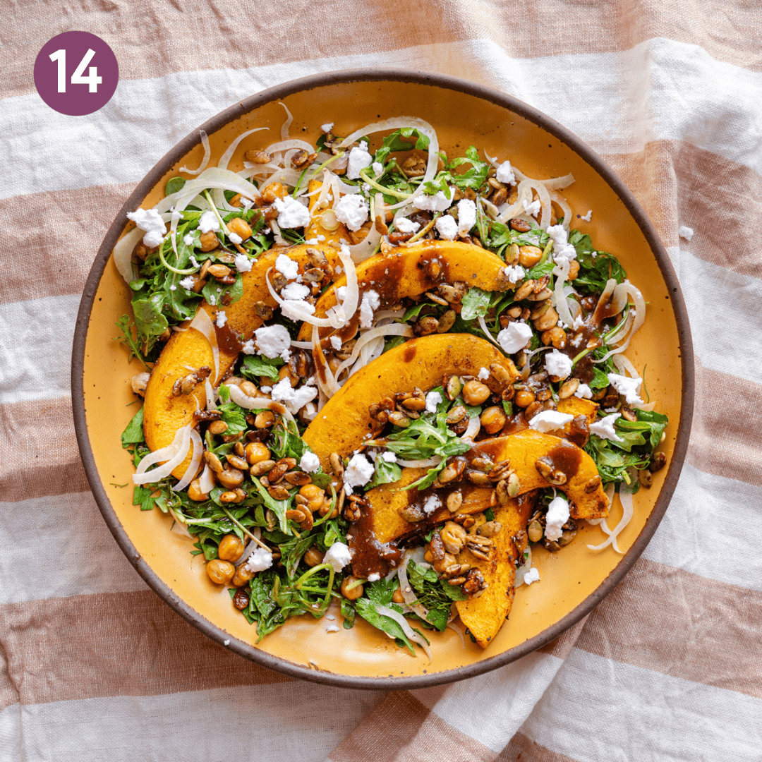 Vegan feta and a bit more of the vinaigrette added to the bowl of pumpkin salad.